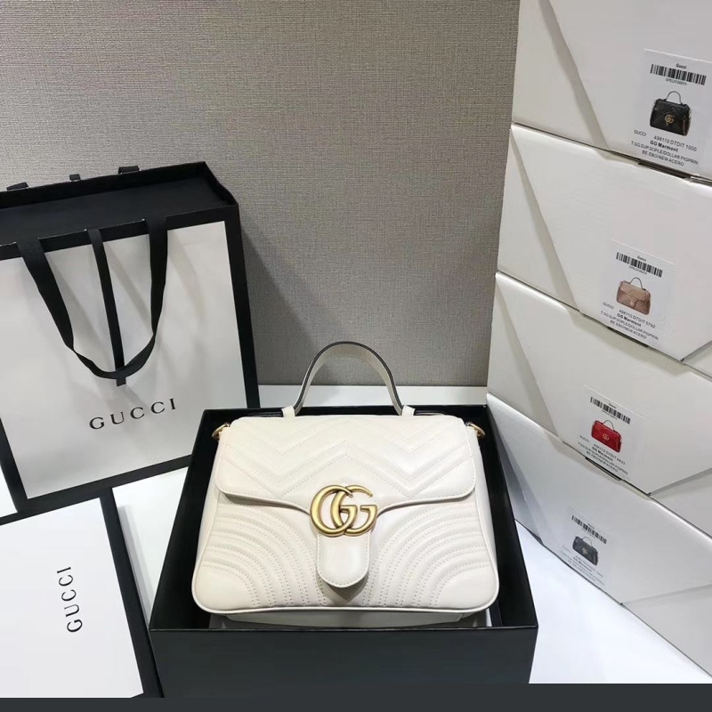G*u*i top handle bags